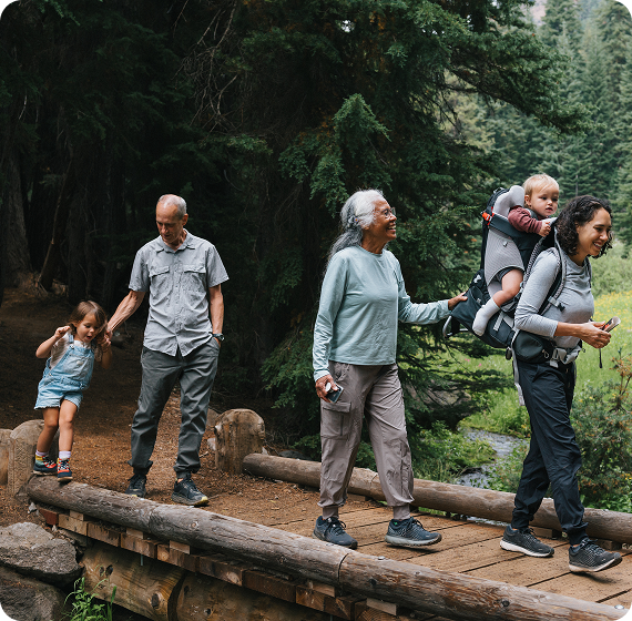 Image of family hiking together on a forest trail