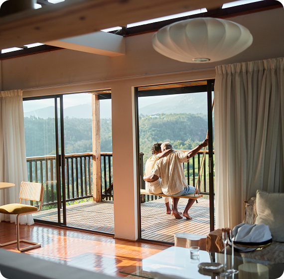Image of sunlit living space with scenic views
