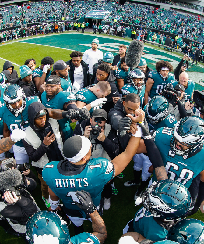 The Philadelphia Eagles celebrating in the end zone.