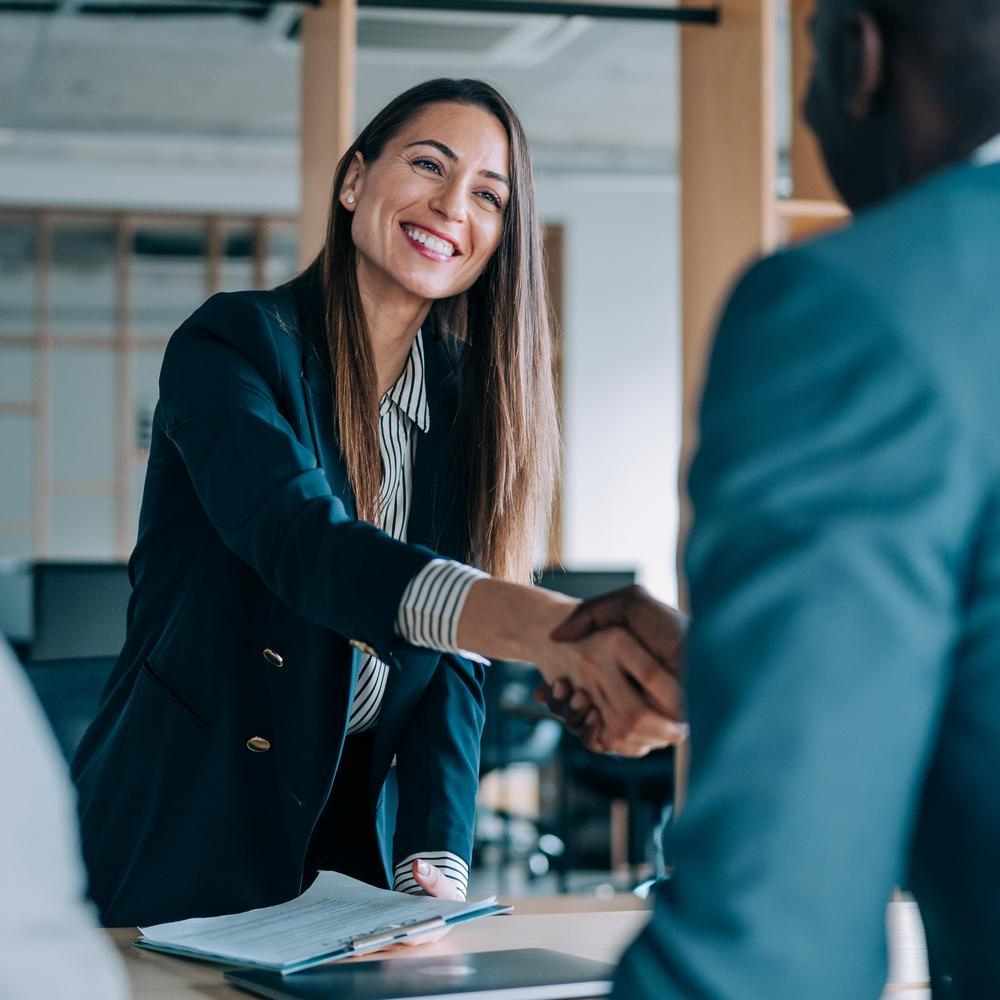 Business partners shaking hands.