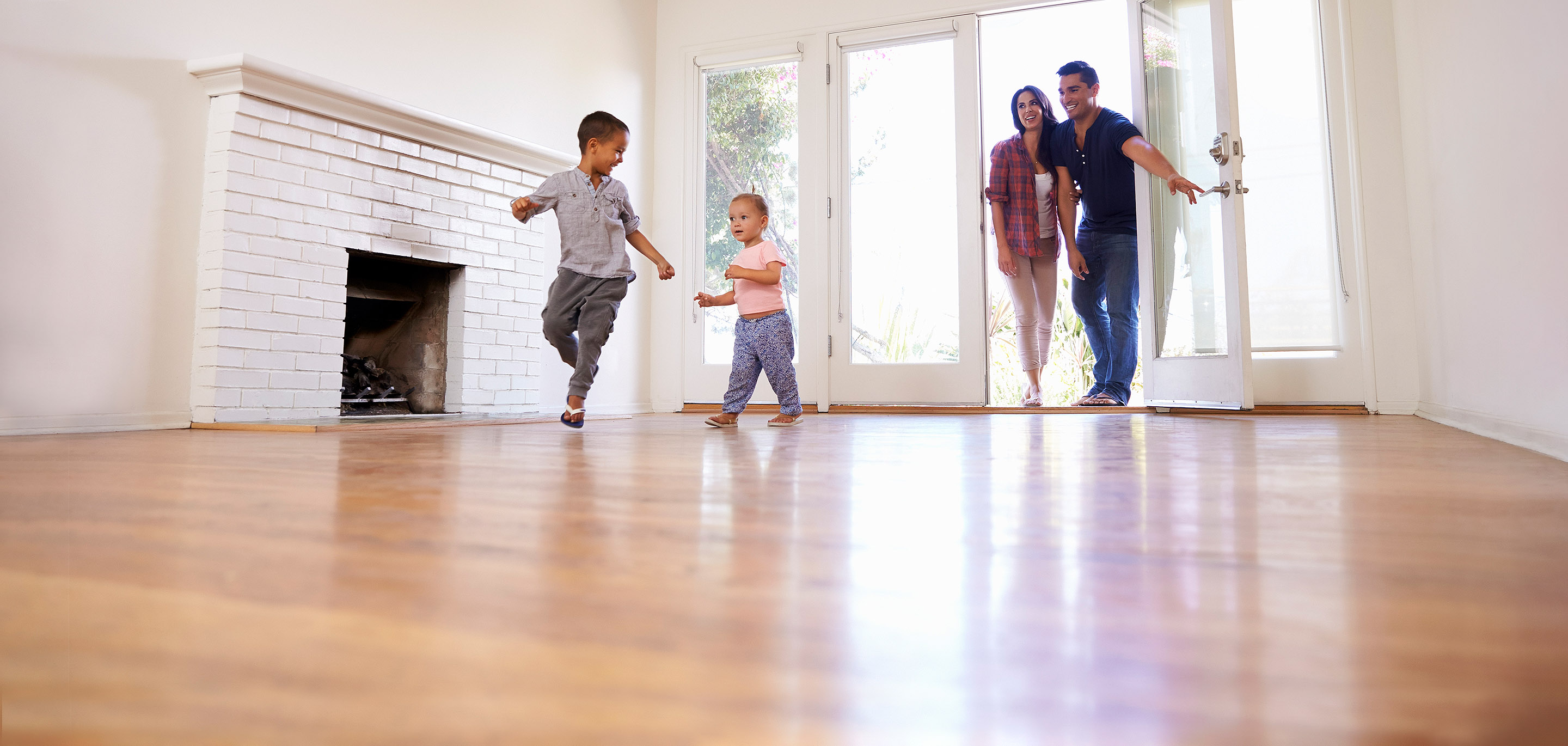 A family happily enters a new house